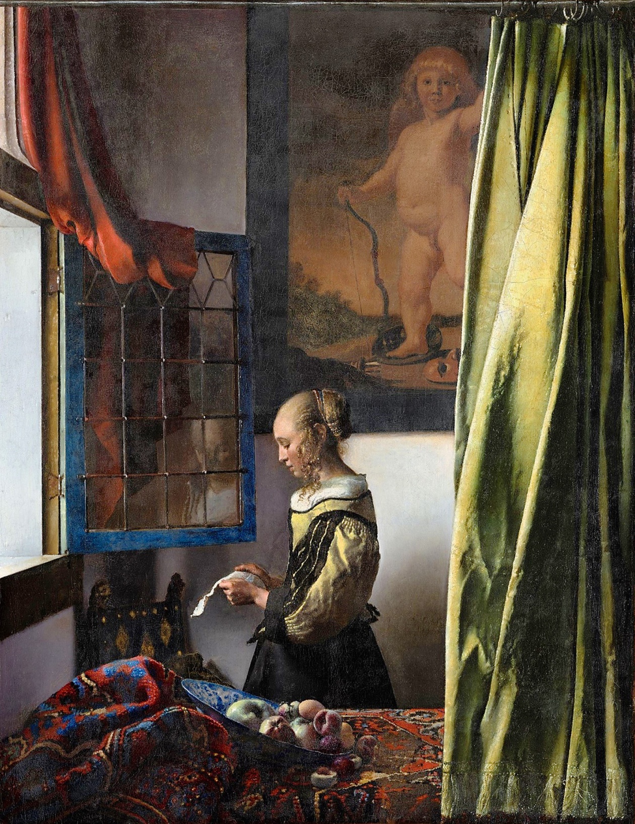 Im Meisterwerk "Briefleserin am offenen Fenster" von Jan Vermeer wurde der Cupido übermalt